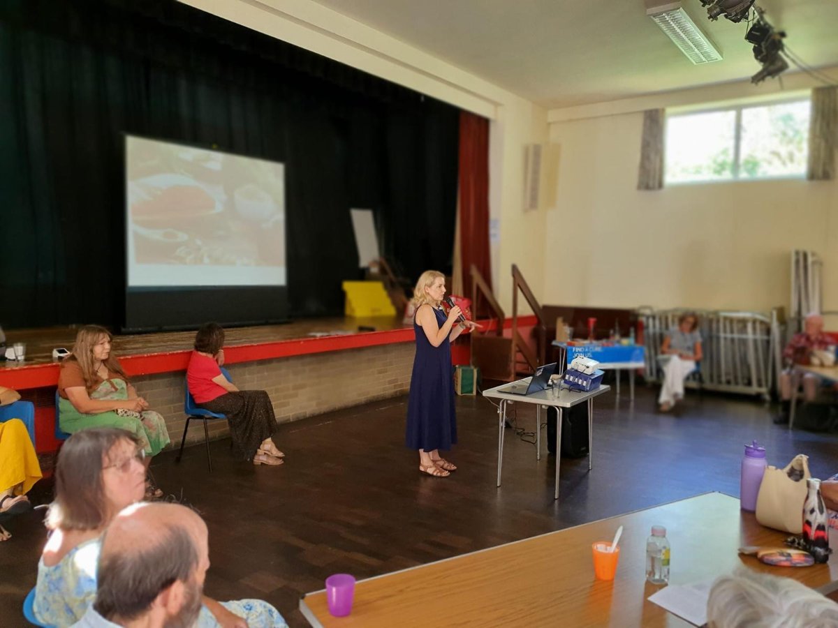 Kinga speaking at a patient and carer education day